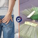 Homem com m&atilde;os nas n&aacute;degas e vassouras sem cabos.