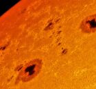 Imagem do sol com manchas.