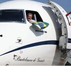 Lula em sua aeronave.