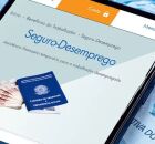 Aplicativo aberto no seguro-desemprego, em celular.