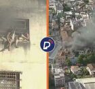 Imagens do inc&ecirc;ndio e pessoas tentando sair do pr&eacute;dio.