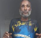 Homem preso pela pol&iacute;cia.