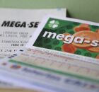 Tal&atilde;o da Mega-Sena e cupom fiscal da Caixa.