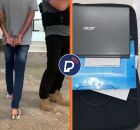 Pol&iacute;cia prendendo envolvido e material apreendido.