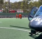 Menino sendo socorrido ap&oacute;s colis&atilde;o.