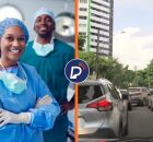 Enfermeiros e carros em rua do Recife