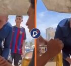 Rodrigo Manga &eacute; visto vendendo amendoim na praia.