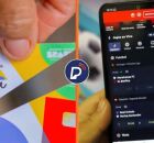 Cart&atilde;o do Bolsa Fam&iacute;lia cortado e celular em aplicativo de apostas.