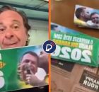 Gilson Machado distribui adesivos.