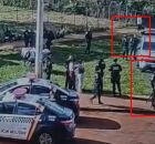 Momento em que foragidos s&atilde;o detidos por policiais.