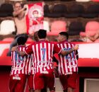 Jogadores comemorando gol 