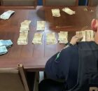 Policial federal recolhe dinheiro investigado