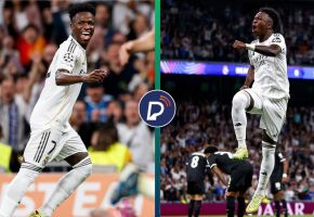 Vini Jr comemorando com a camisa do Real Madrid.