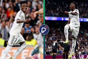 Vini Jr comemorando com a camisa do Real Madrid.