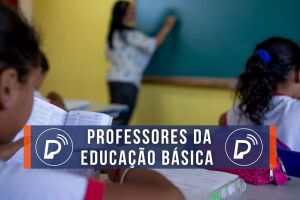 Professora da educa&ccedil;&atilde;o b&aacute;sica dando aula.
