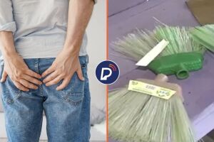 Homem com m&atilde;os nas n&aacute;degas e vassouras sem cabos.