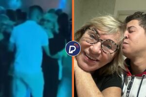 M&atilde;e de Eliana aparece dan&ccedil;ando e beijando novo namorado.