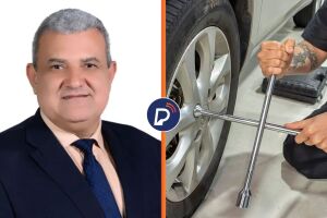 Vereador La&eacute;rcio Noberto J&uacute;nior ao ladode uma imagem ilustrativa de uma chave de roda.