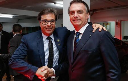 Ex-presidente Jair Bolsonaro ao lado de Gilson Machado Neto.