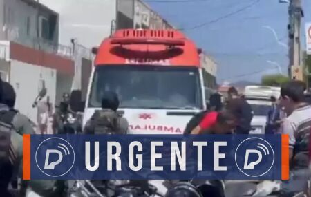 Ambul&acirc;ncia em local ap&oacute;s tiroteio.