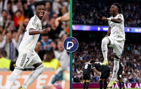 Vini Jr comemorando com a camisa do Real Madrid.