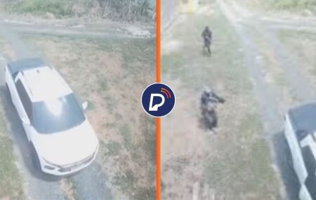 Momento em que casal &eacute; emboscado por dupla encapuzada, em Moreno.