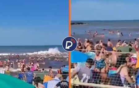 Banhistas em praia de Buenos Aires, onde ocorreu mini tsunami.