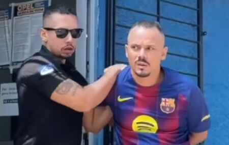 Eric Macedo Pereira, de 29 anos, saindo do DHPP.