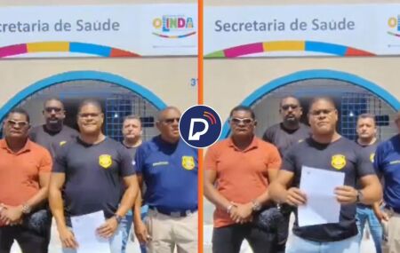 Membros do Sindicato dos Vigilantes, em frente &agrave; Secretaria de Sa&uacute;de de Olinda.