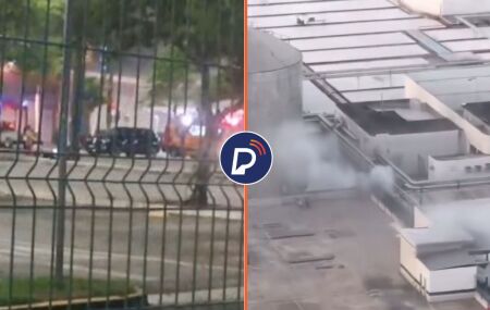 Momento em que viaturas atuam no combate &agrave; chamas e vista do Shopping Recife em chamas.