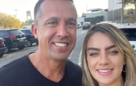 Tenente-coronel Geraldo Leite, suspeito de matar esposa PM, que est&aacute; ao lado dele.