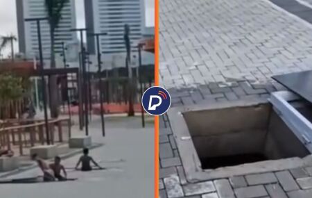 Crian&ccedil;as nadando em cisterna no Parque Eduardo Campos, no Recife.