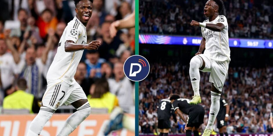 Vini Jr comemorando com a camisa do Real Madrid.