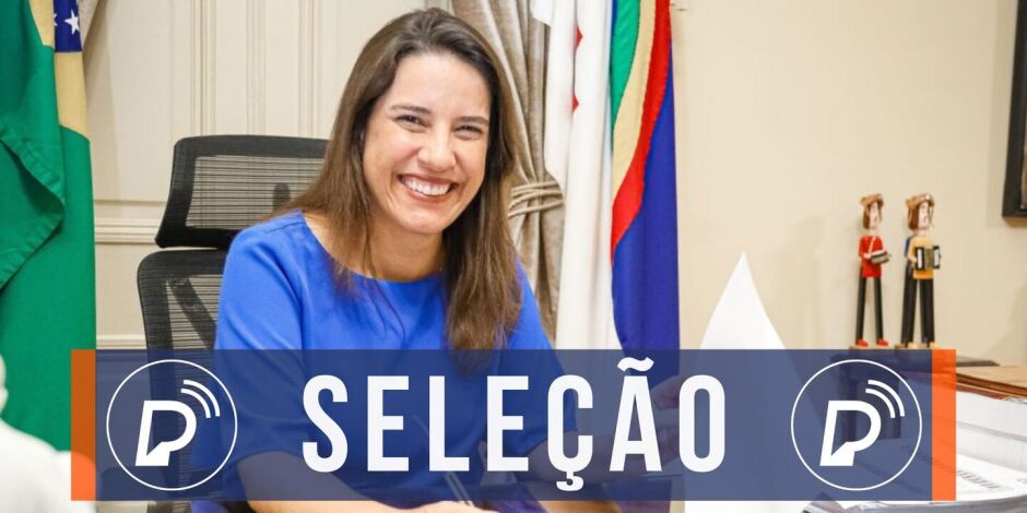 Raquel Lyra assinando documento.