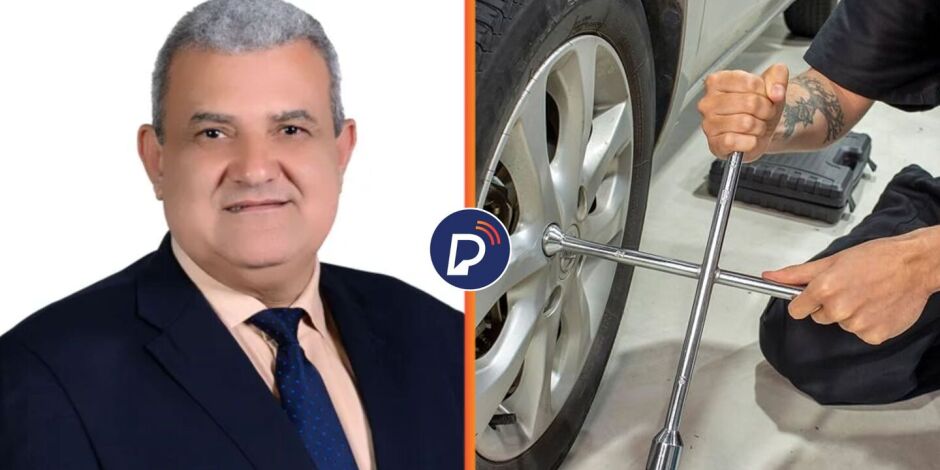 Vereador La&eacute;rcio Noberto J&uacute;nior ao ladode uma imagem ilustrativa de uma chave de roda.